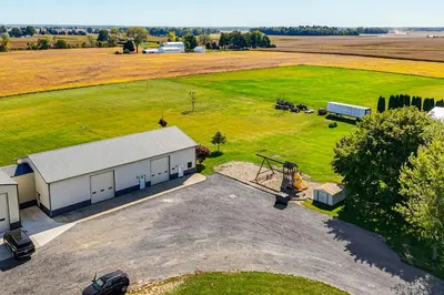 an overhead view of a barn and a large field at 1 Mi to Main St! Family Farmhouse in West Unity