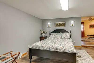 a bedroom with a bed in a room at 1 Mi to Main St! Family Farmhouse in West Unity