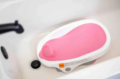 a pink and white appliance sitting on top of a sink at Movie Theater-Game Room-Parking-Heart Of Cleveland in Cleveland