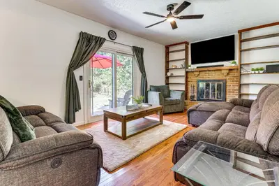 a living room with two couches and a tv at Shop, Golf and Explore Home 14 Mi to Columbus! in Pickerington
