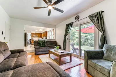 a living room with a couch and a table at Shop, Golf and Explore Home 14 Mi to Columbus! in Pickerington