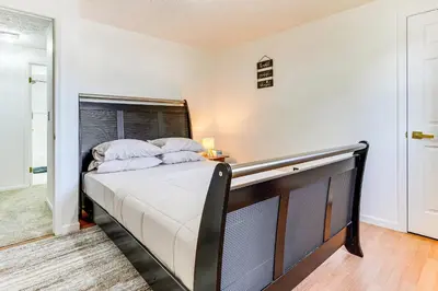 a bedroom with a large bed in a room at Shop, Golf and Explore Home 14 Mi to Columbus! in Pickerington