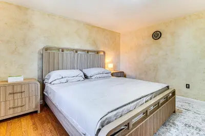 a bedroom with a large bed in a room at Shop, Golf and Explore Home 14 Mi to Columbus! in Pickerington