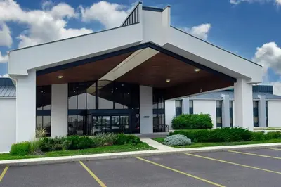 an empty parking lot in front of a building at 1734 West Hotel in Fort Wayne