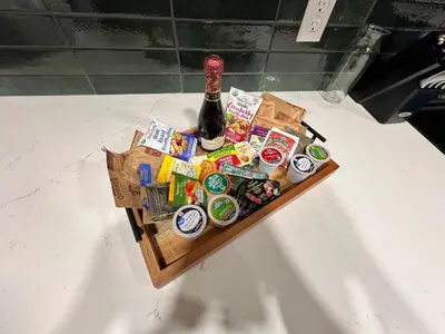 a miniature table with a bottle of beer and snacks at Gorgeous Timberwood 3bedr 3bath with basement 4 beds in Sharonville