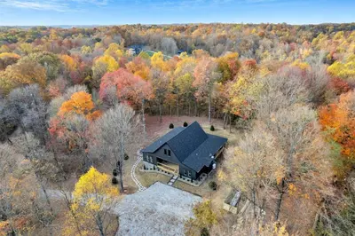 an aerial view of a house in the woods at Luxury Cabin in Hocking Hills The Buffalo in Logan