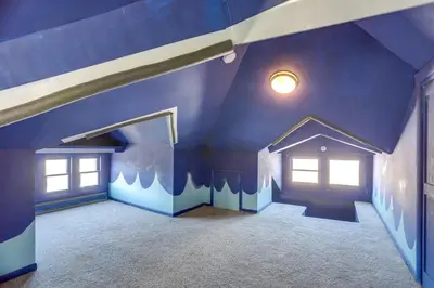 a room with a blue ceiling and windows at Walk to Port Clinton Lighthouse Home with Deck! in Port Clinton