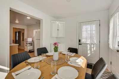 a dining room with a table and chairs at Easy I-80 Access! Newly Updated McDonald Home