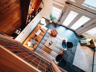 an overhead view of a living room with a couch at Cozy A-Frame Getaway Minutes from Nelson Ledges
