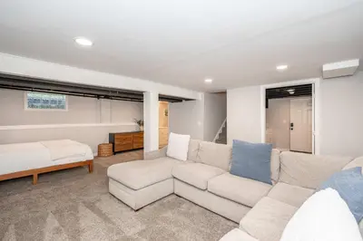 a living room with a couch and a bed at Valley Ridge Retreat - For 8 in Cincinnati