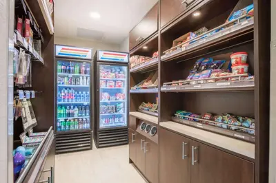 a walk in pantry filled with lots of drinks at Hawthorn Suites by Wyndham Bridgeport in Bridgeport