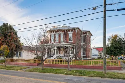 an old house on the side of the street at 2 Blocks to Ohio River! Historic Victorian Gem in Gallipolis