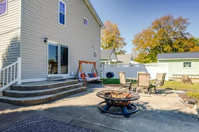 a patio with a fire hydrant and a house at 10 Mi to Mad River Mtn Family-Friendly Retreat! in West Liberty