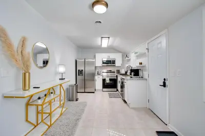 a kitchen with white walls and white appliances at 21 Mi to Dtwn Columbus Quiet Country Escape in Pataskala