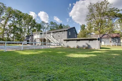 a house with a large yard in front of a building at 21 Mi to Dtwn Columbus Quiet Country Escape in Pataskala