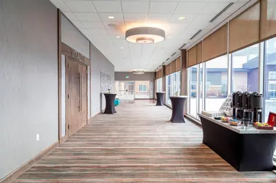 a hallway of an office with a long corridor at Residence Inn by Marriott Cleveland Avon at The Emerald Event Center in Avon