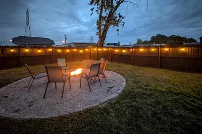 a group of chairs and a table in a yard at Pet-Friendly Oakley Gem with Large Backyard! in Cincinnati