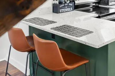 a kitchen with two chairs and a counter top at Hot-Tub Sauna Cold Plunge - Evergreen Escape in Campton