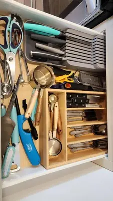 a drawer filled with lots of kitchen utensils at WiFi Firepit Fishing Pond - FarmView in Hazel Green