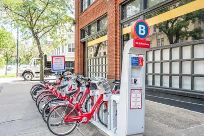 a row of bikes parked in front of a building at The 333 Suites 201 - Stay for 6 in Cincinnati