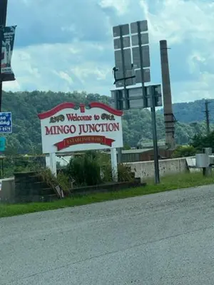 a sign for a micoco junction on the side of a road at Marina house