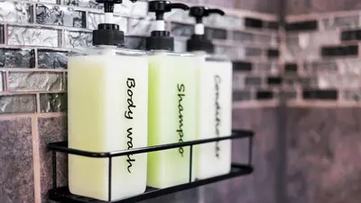a group of white bottles on a shelf in a bathroom at Hearth Home Brick Oven Karaoke 4 Bedroom fits 8 in Columbus