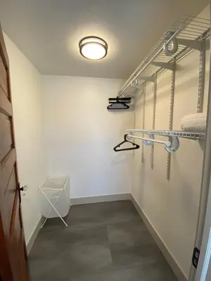 a walk in shower in a room at Totally renovated large family getaway! King bed