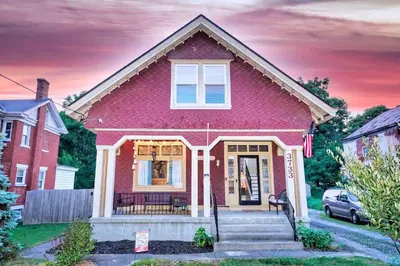 a house with a pink house at Nell's Place in Cincinnati