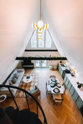 an overhead view of a living room with tables and chairs at Secluded A-Frame Hocking Hills Hot Tub Fire Pit in South Bloomingville