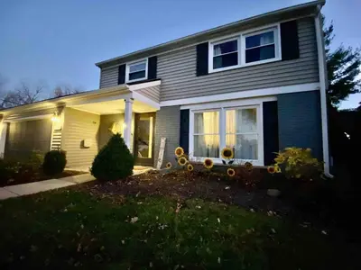 a house with a porch and a yard at [4-BR/Sleeps 12] Family & Friends Home in Indiana in New Haven