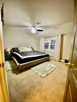 a bedroom with a bed and a ceiling fan at [4-BR/Sleeps 12] Family & Friends Home in Indiana in New Haven