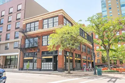 a red brick building on a city street at The 333 Suites 204 - Stay for 2 in Cincinnati