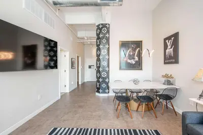 a dining room with a table and chairs at The 333 Suites 301 - Suite for 6 in Cincinnati