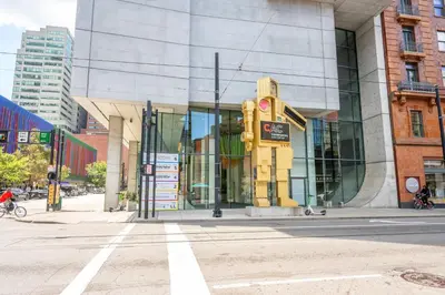 a city street with a traffic light in front of a building at The 333 Suites 304 - Stay for 2 in Cincinnati