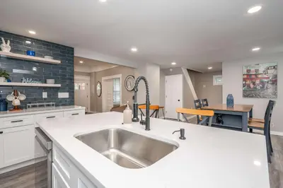 a kitchen with a sink and a counter top at The Gathering House - Home for 6 in Harrison