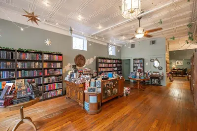 a book store with many shelves of books at The Gathering House - Home for 6 in Harrison