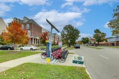 a group of bikes parked next to a street at 1 Mi to Dtwn Cincinnati Spacious Townhome with Deck in Cincinnati