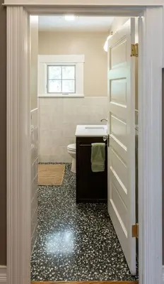 a bathroom with a sink and a toilet and a window at The Railway Retreat - Downtown Sylvania in Sylvania