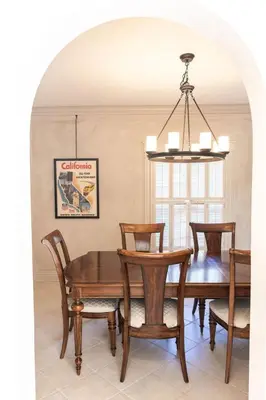 a dining room with a wooden table and chairs at The Railway Retreat - Downtown Sylvania in Sylvania