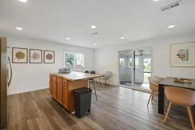 a kitchen and dining room with a table and chairs at Good Vibes Only in Thornville