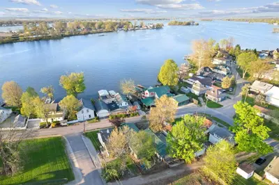 an aerial view of a village on the river at Chicks on Canal