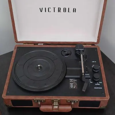 a wooden suitcase with a cd in it at Nostalgic in Nelsonville in Nelsonville