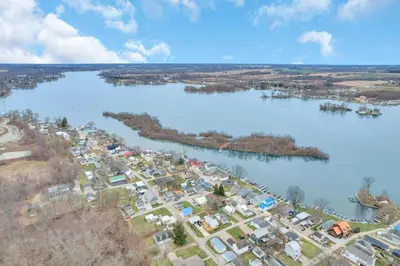 an aerial view of a city next to a river at Gone Fishin in Buckeye Lake