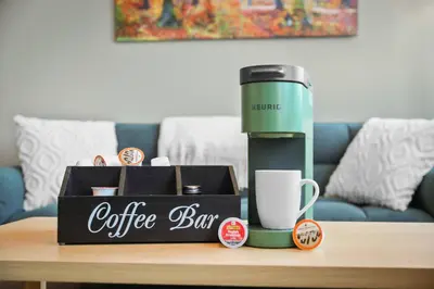 a coffee bar on a coffee table with a coffee box at 1BR • City View • Huntington • King Bed • 2 TVs in Cleveland