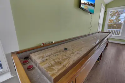 a large pool in the corner of a room at The Lakehouse in Buckeye Lake