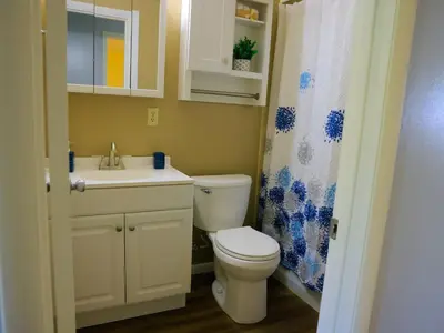 a bathroom with a toilet and a sink and a shower at A Nice and Cozy Home in Fairborn in Fairborn