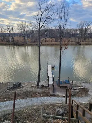 a dock in the middle of a lake at Perrysburg On The River in Perrysburg