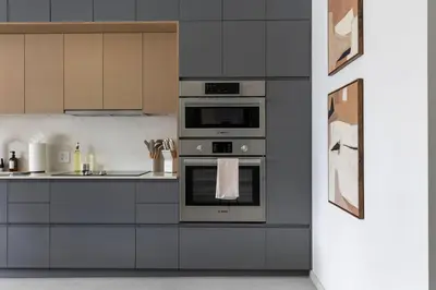a kitchen with a stove and a sink at Resort Style Property 2B 2B walk to Everything! in Cleveland