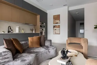 a living room with a couch and a table at Resort Style Property 2B 2B walk to Everything! in Cleveland