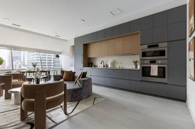 a kitchen and living room with a couch and a table at Resort Style Property 2B 2B walk to Everything! in Cleveland